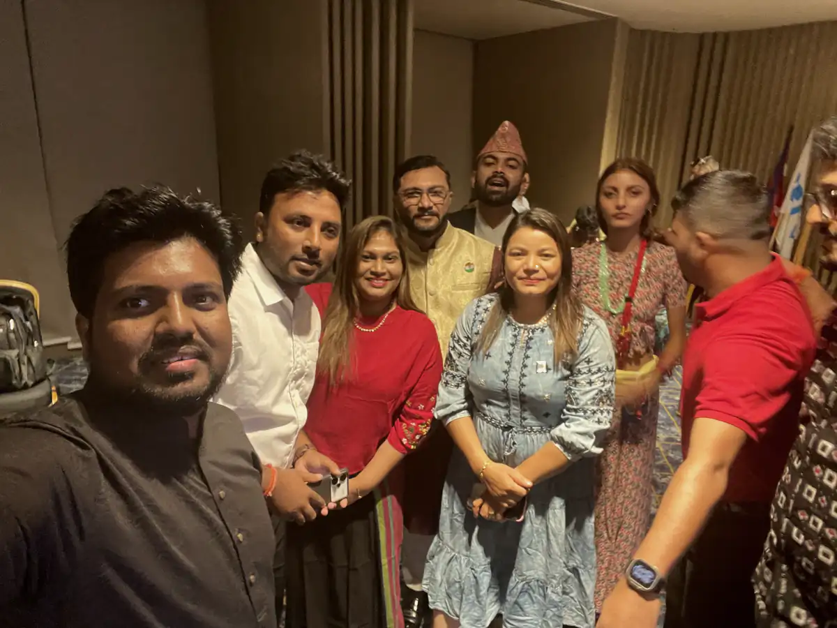 Abdul Mannan Zinnat taking a selfie with a group of delegates